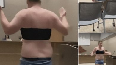 Photo of Dad strips down at school board meeting to make a point