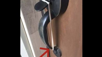 Photo of If you spot a rubber band on your front door handle, you need to know the sick thing it means