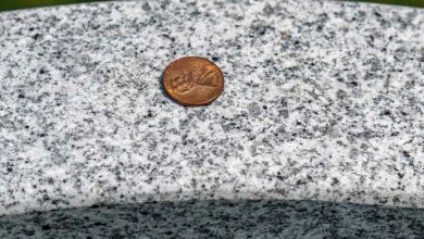 Photo of Why Do Some People Place Coins on Gravestones?