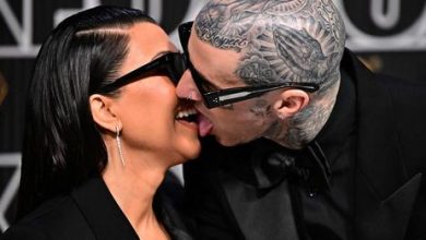 Photo of Kourtney Kardashian and Travis Barker Make Out at Emmys (in Matching Suits!) for First Post-Baby Red Carpet