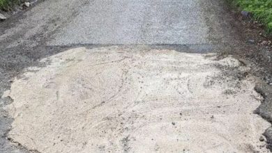 Photo of Motorist Fills Pothole Without Consent- Private Company Gets Enraged