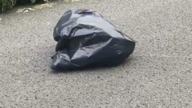 Photo of Woman Swerves To Miss Trash Bag In Road, Looks Closer And Gets The Chills