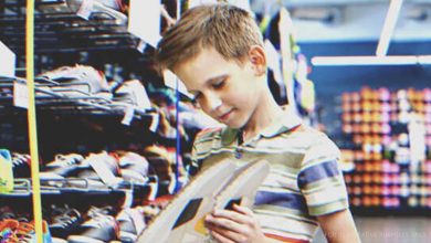 Photo of A Boy Sacrifices His Dream Shoes to Purchase Boots for a Needy Classmate, and Soon a Truck Arrives at His Home with an Unexpected Reward