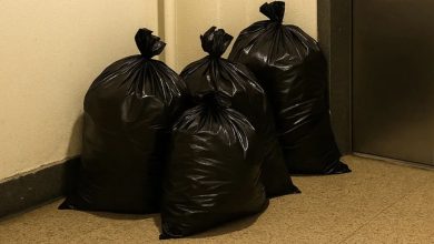 Photo of I came back to find all my belongings stuffed into trash bags by the elevator — then my mother-in-law swung open my apartment door and completely floored me